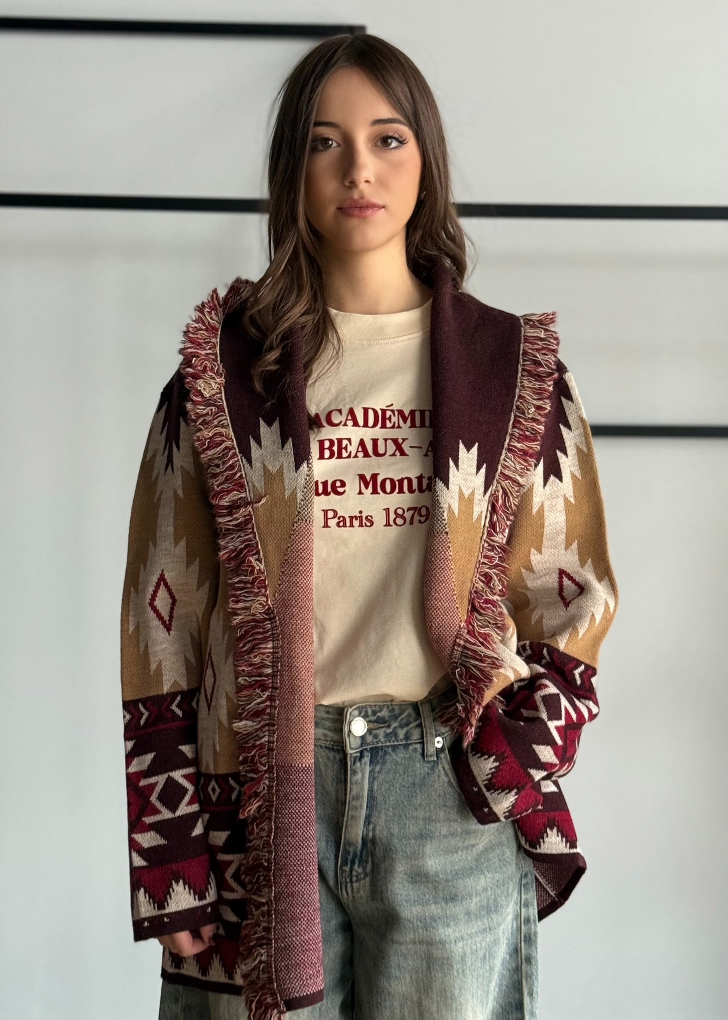 Cardigan jacquard etnico con frange e cintura