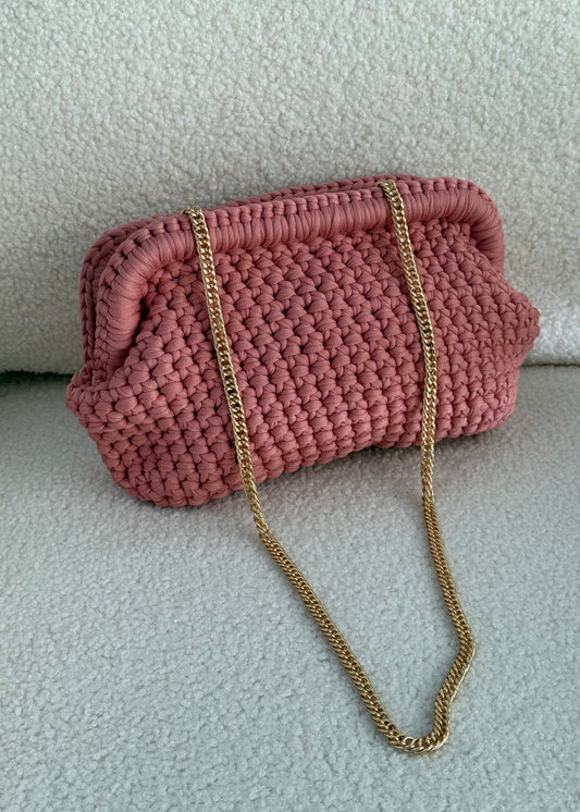 Clutch intrecciata malva