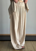 Carica l'immagine nel visualizzatore della galleria, Pantalone palazzo ecrù vita elasticizzata
