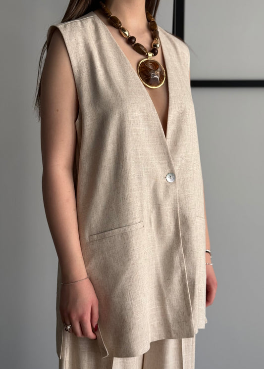 Gilet lungo ecrù con bottone