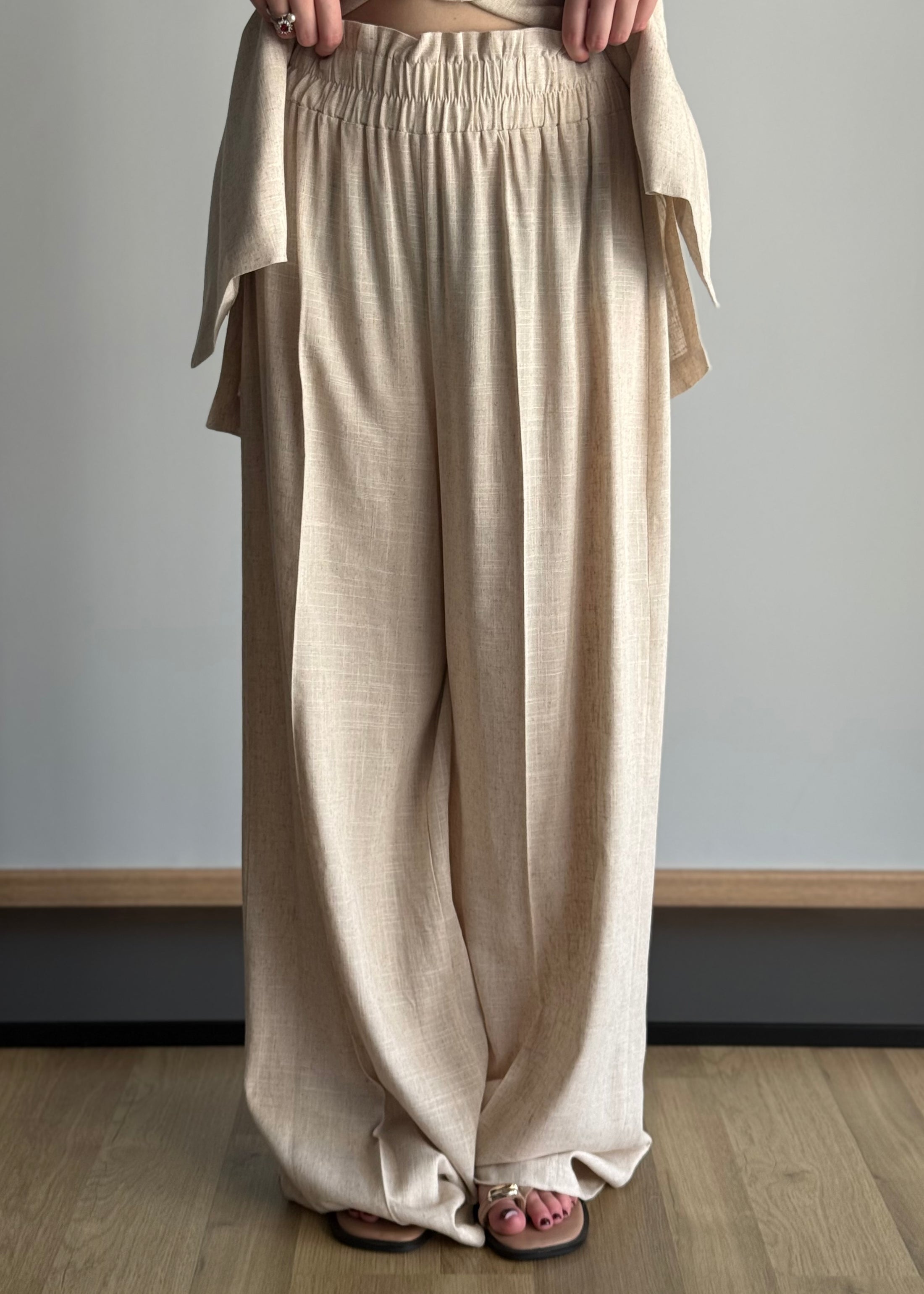 Pantalone palazzo ecrù vita elasticizzata