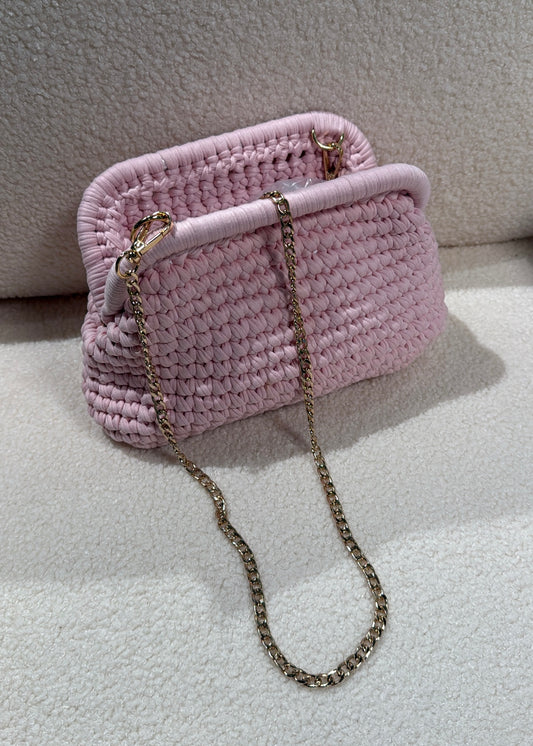 Clutch intrecciata rosa