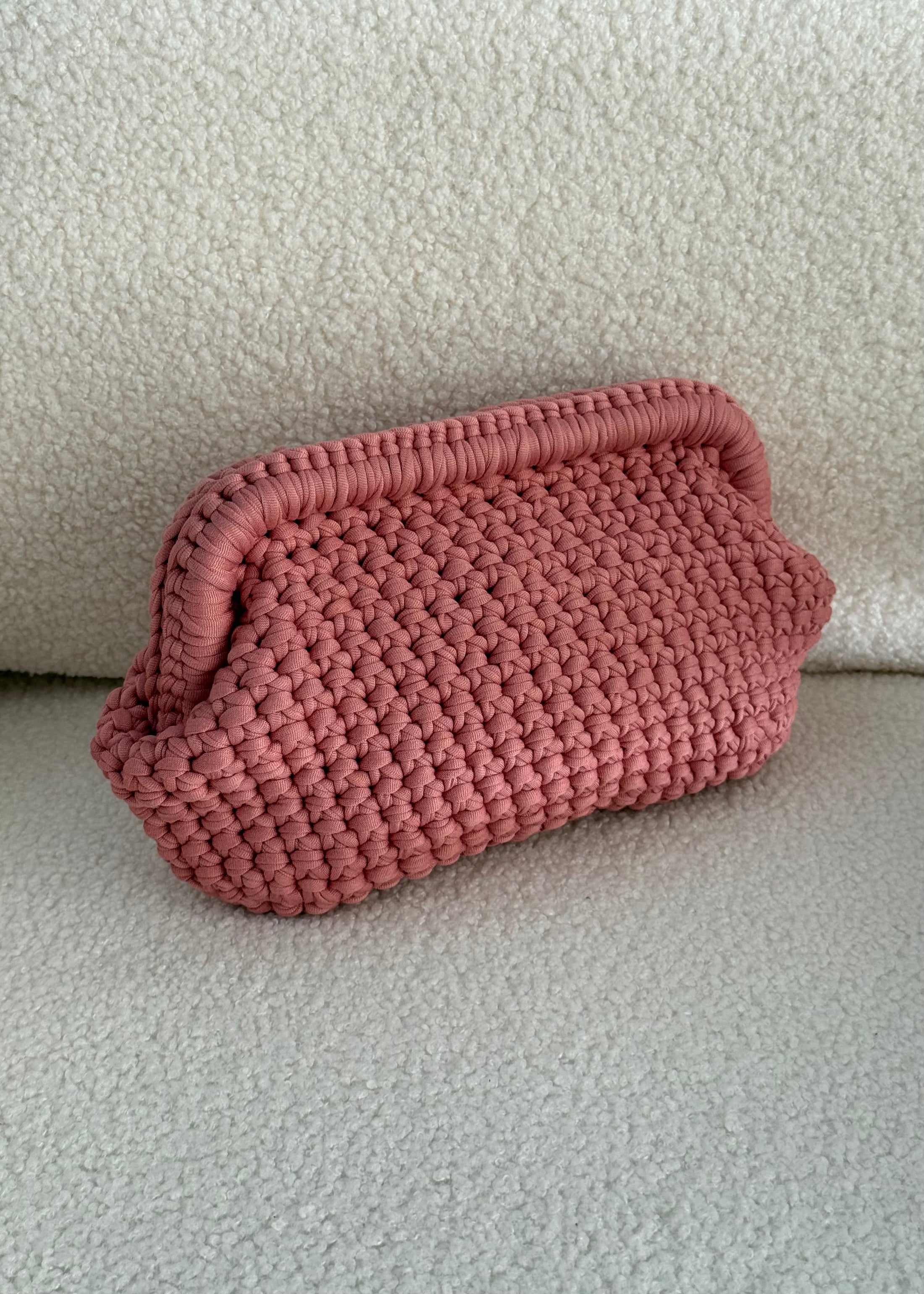 Clutch intrecciata malva