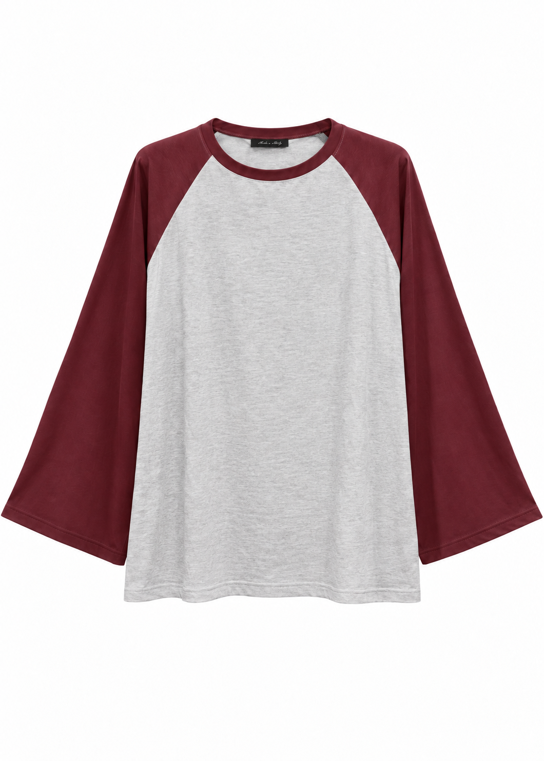T-shirt bicolore con maniche raglan svasate