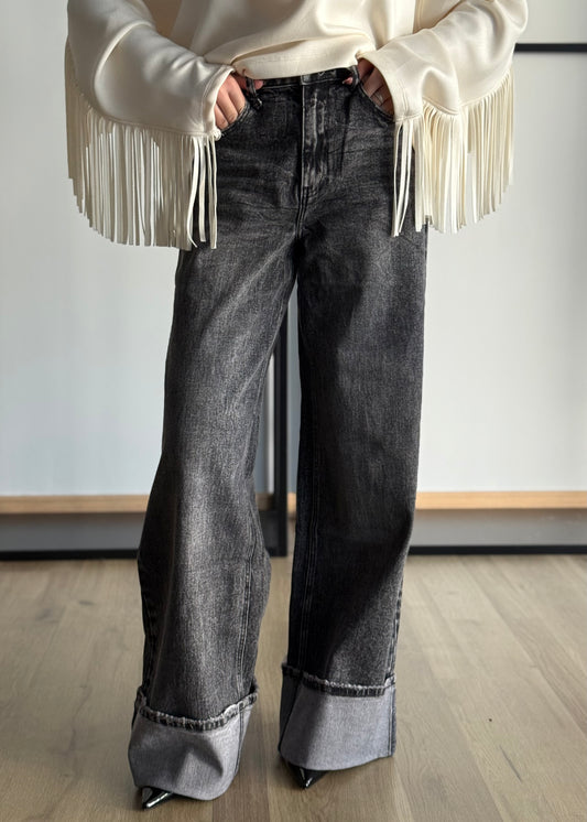 Jeans nero wide leg con risvolto