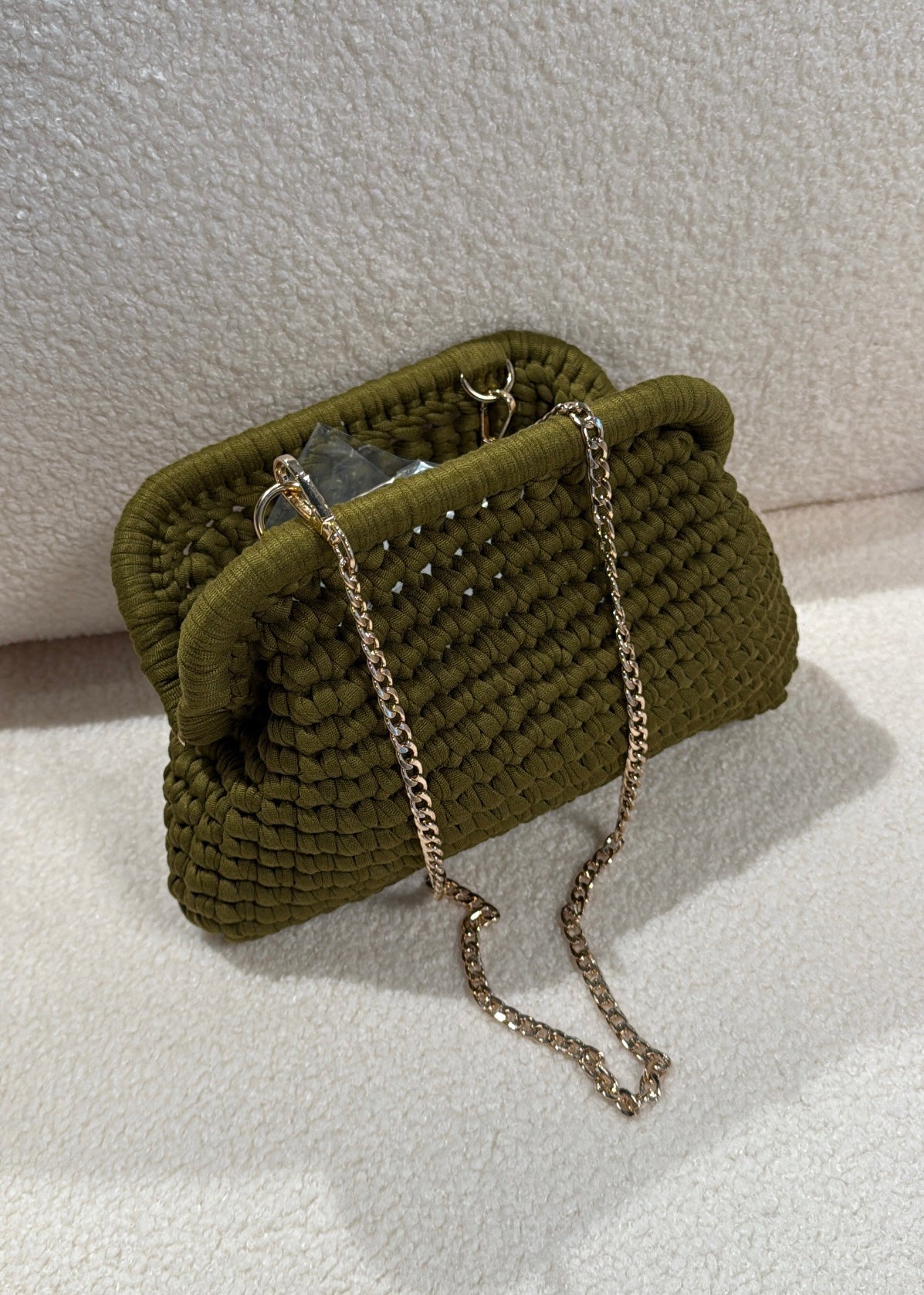 Clutch intrecciata olio