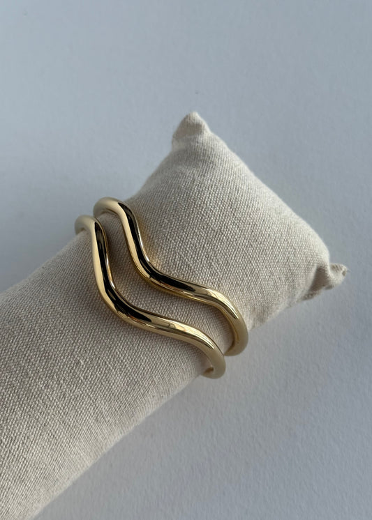 Bracciale rigido dorato doppia onda
