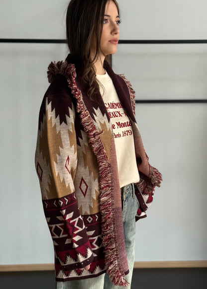 Cardigan jacquard etnico con frange e cintura