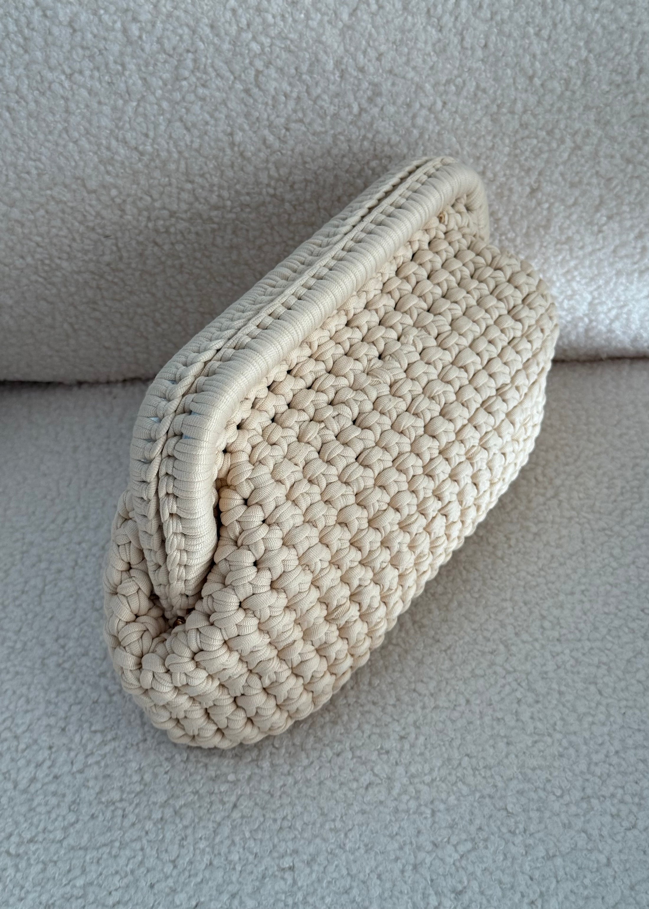 Clutch intrecciata beige chiaro