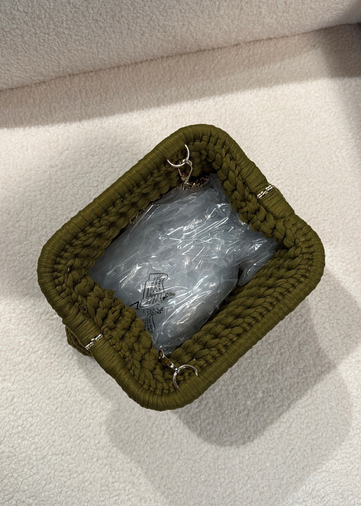 Clutch intrecciata olio
