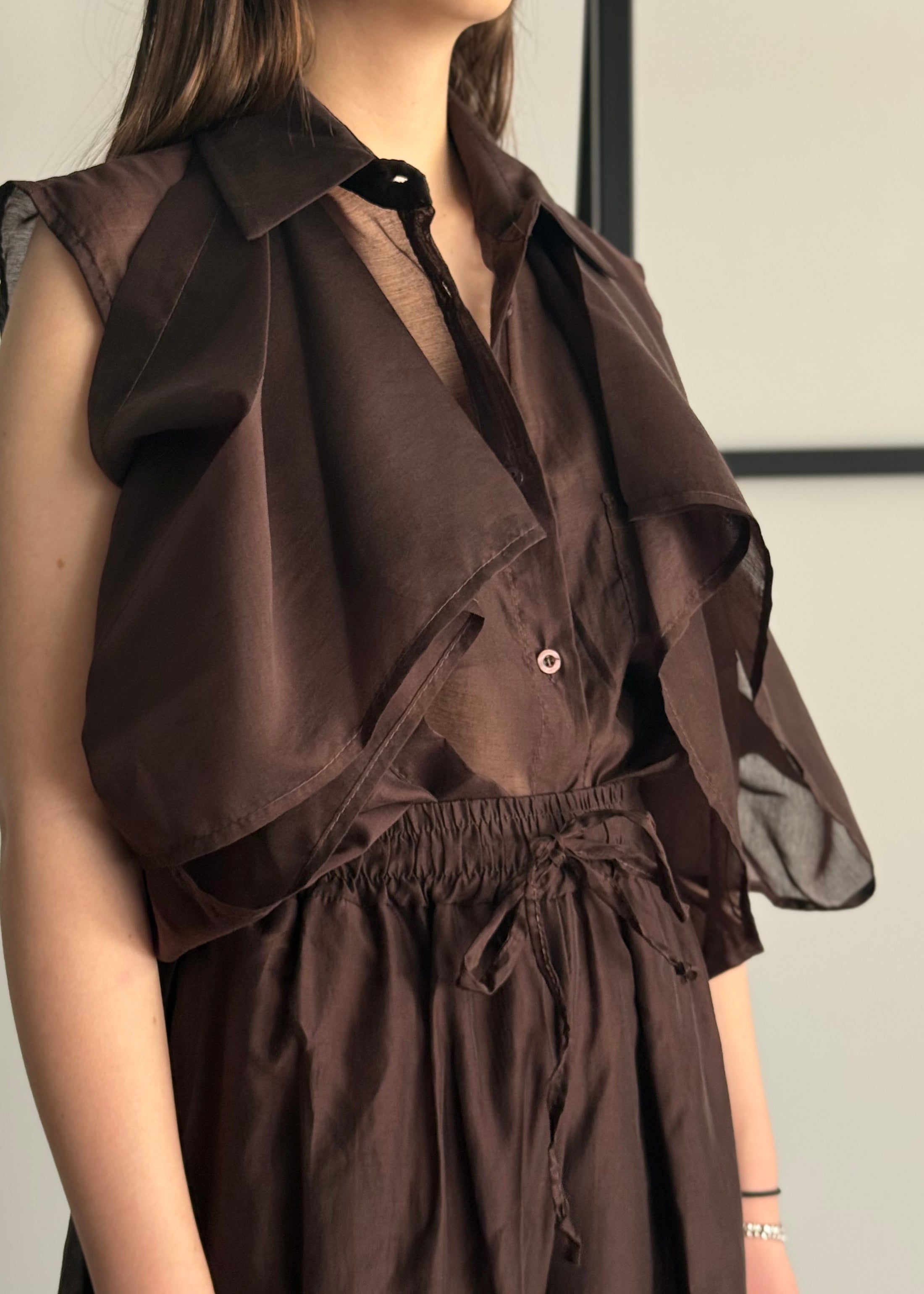 Camicia moro trasparente con volant