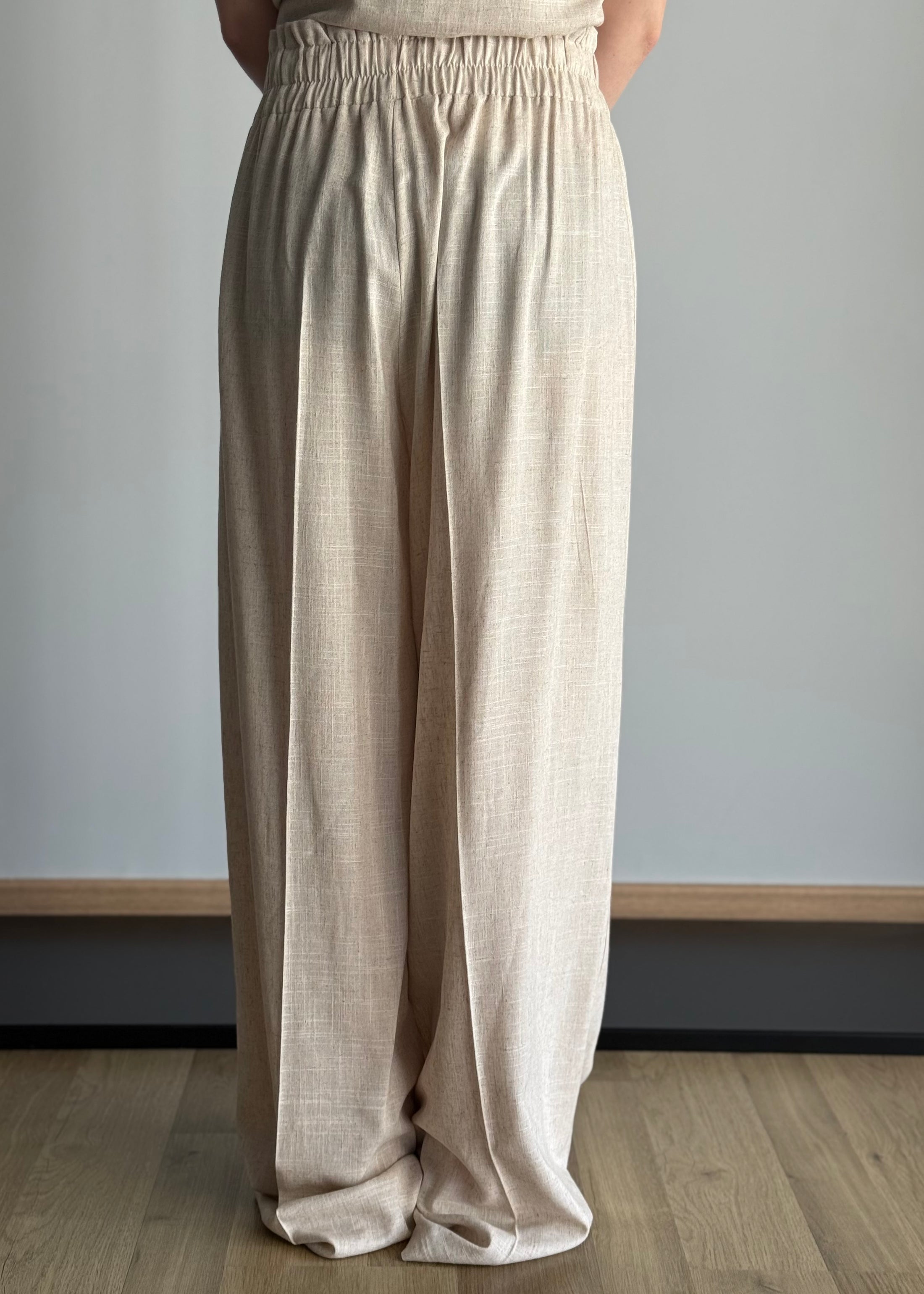 Pantalone palazzo ecrù vita elasticizzata