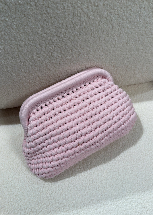 Clutch intrecciata rosa