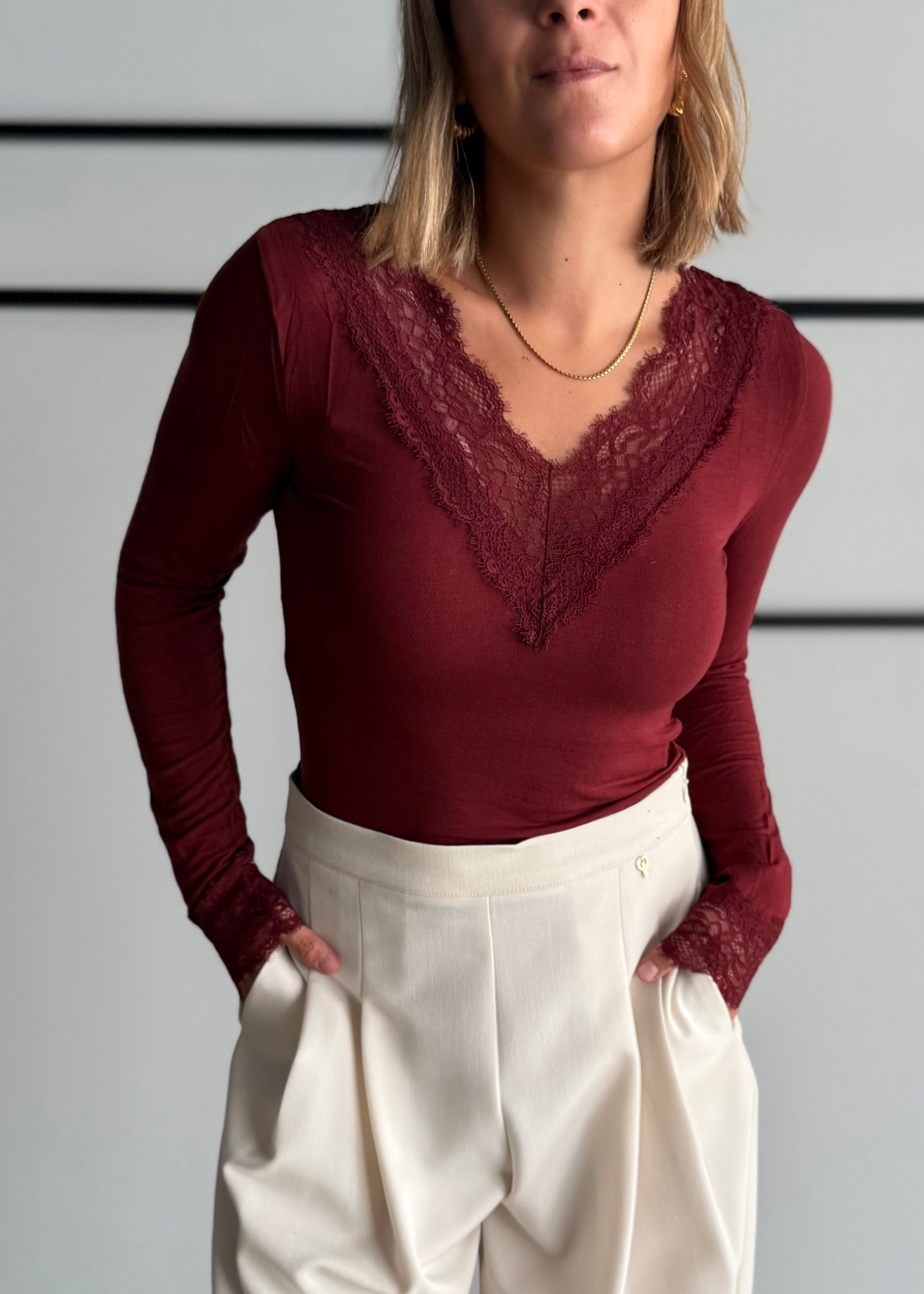 Body vino con pizzo