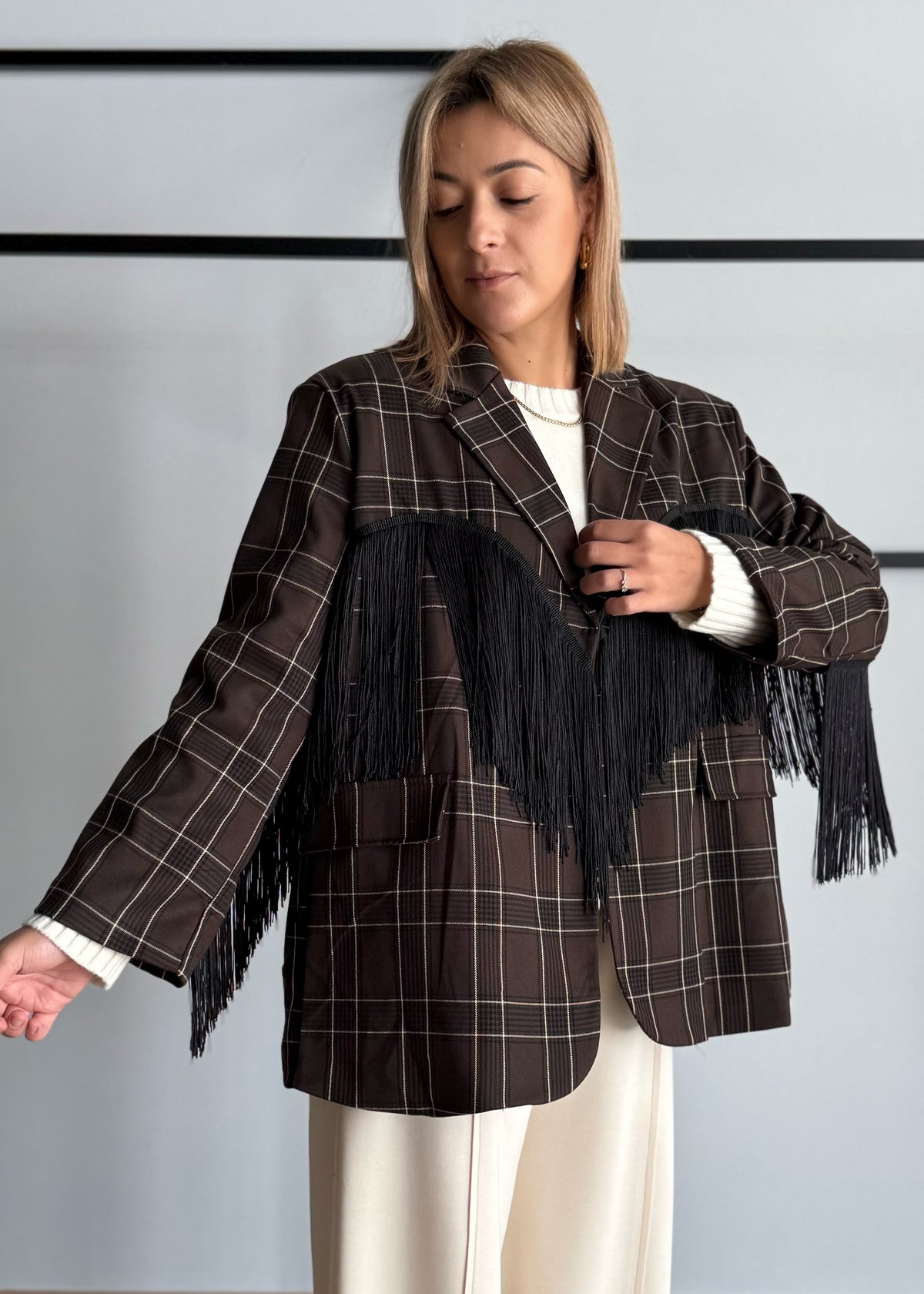 Blazer a quadri con frange nere