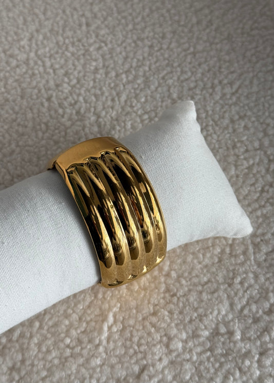 Bracciale THEVICE rigido con design ondulato