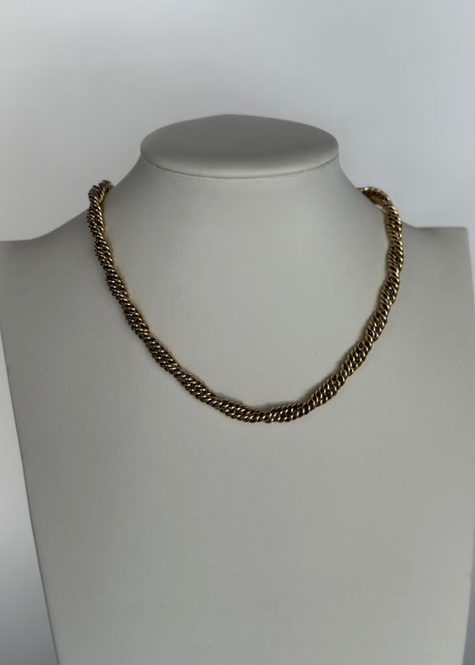 Collana dorata a corda intrecciata