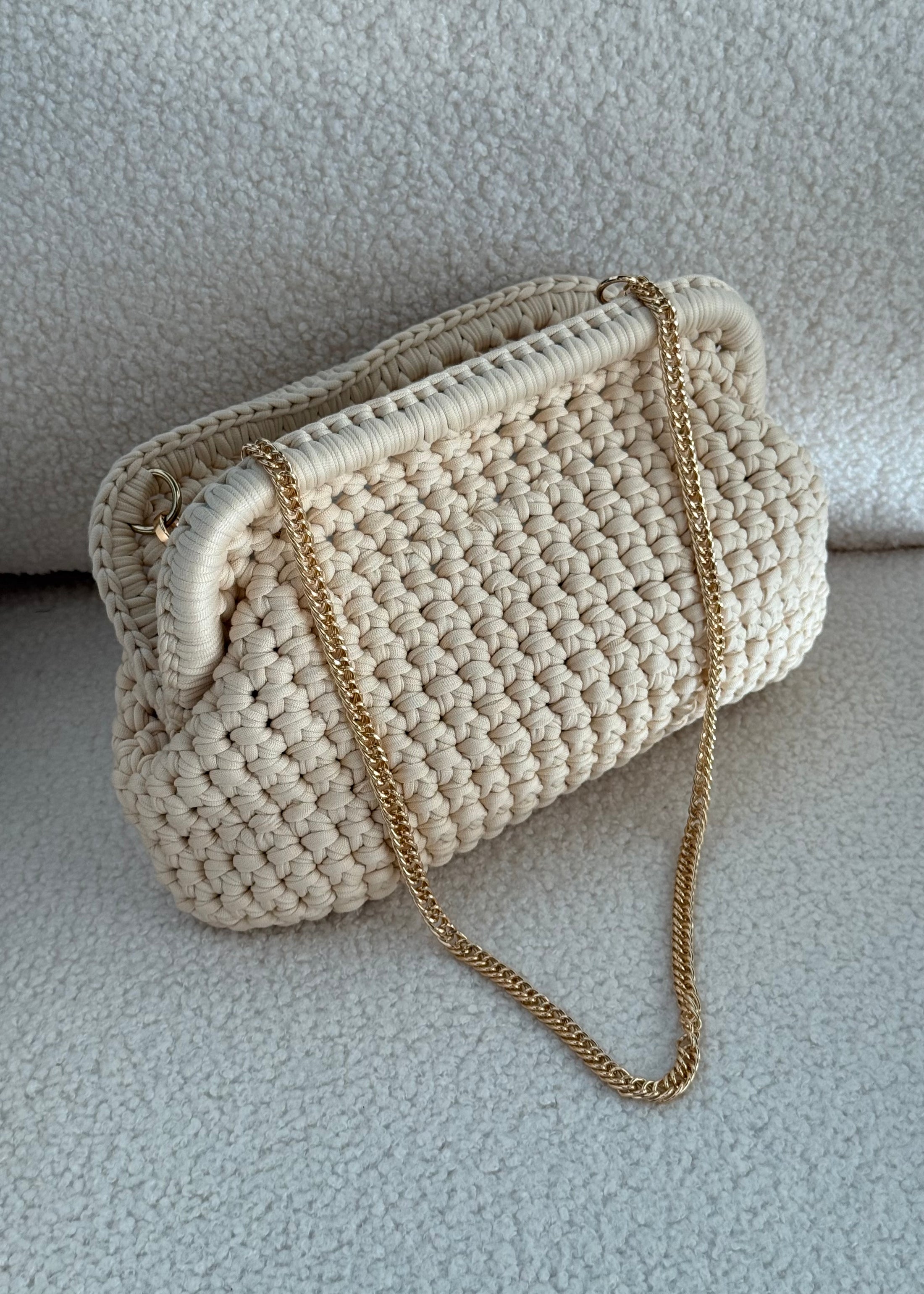 Clutch intrecciata beige chiaro