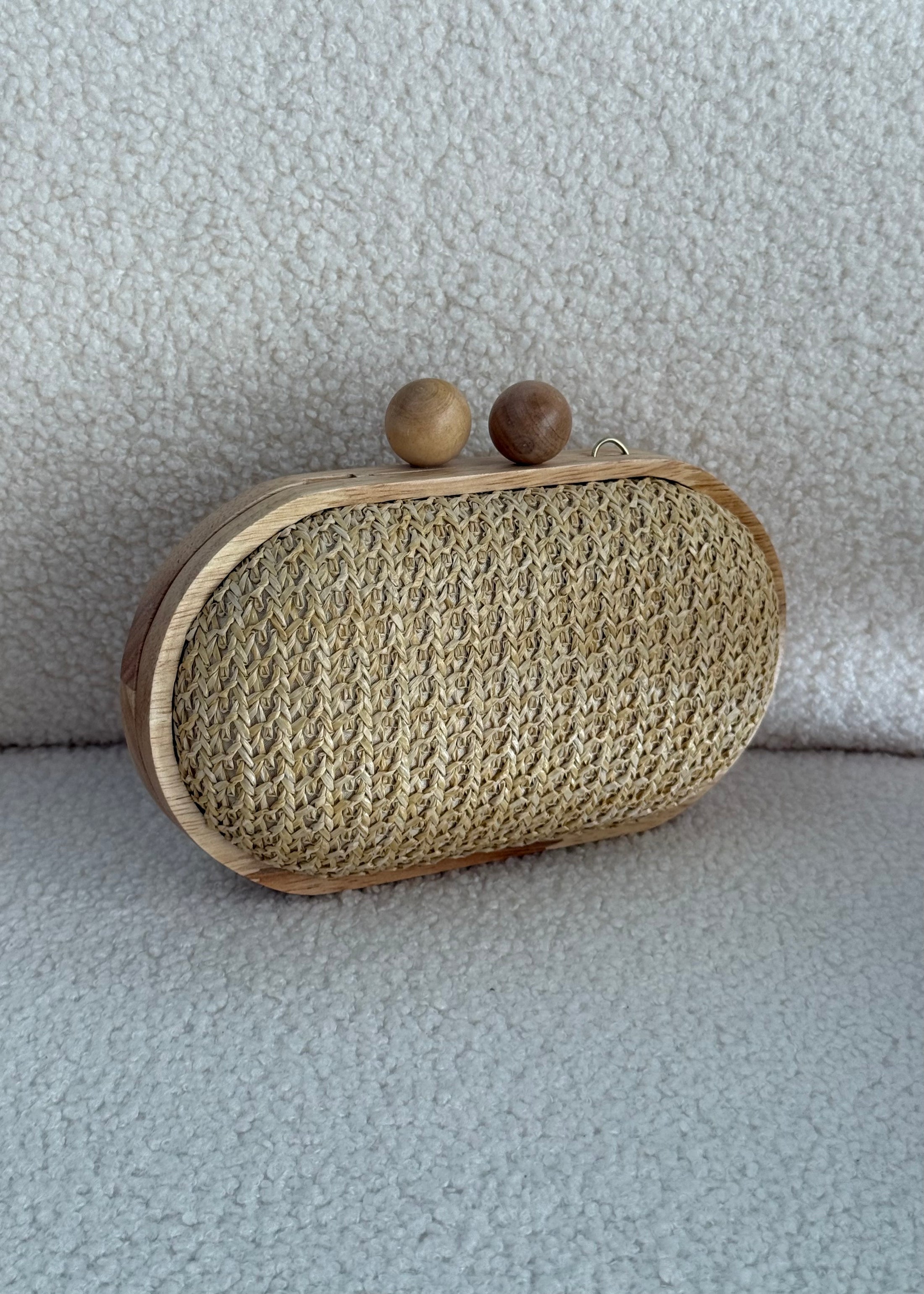 Clutch in rafia beige